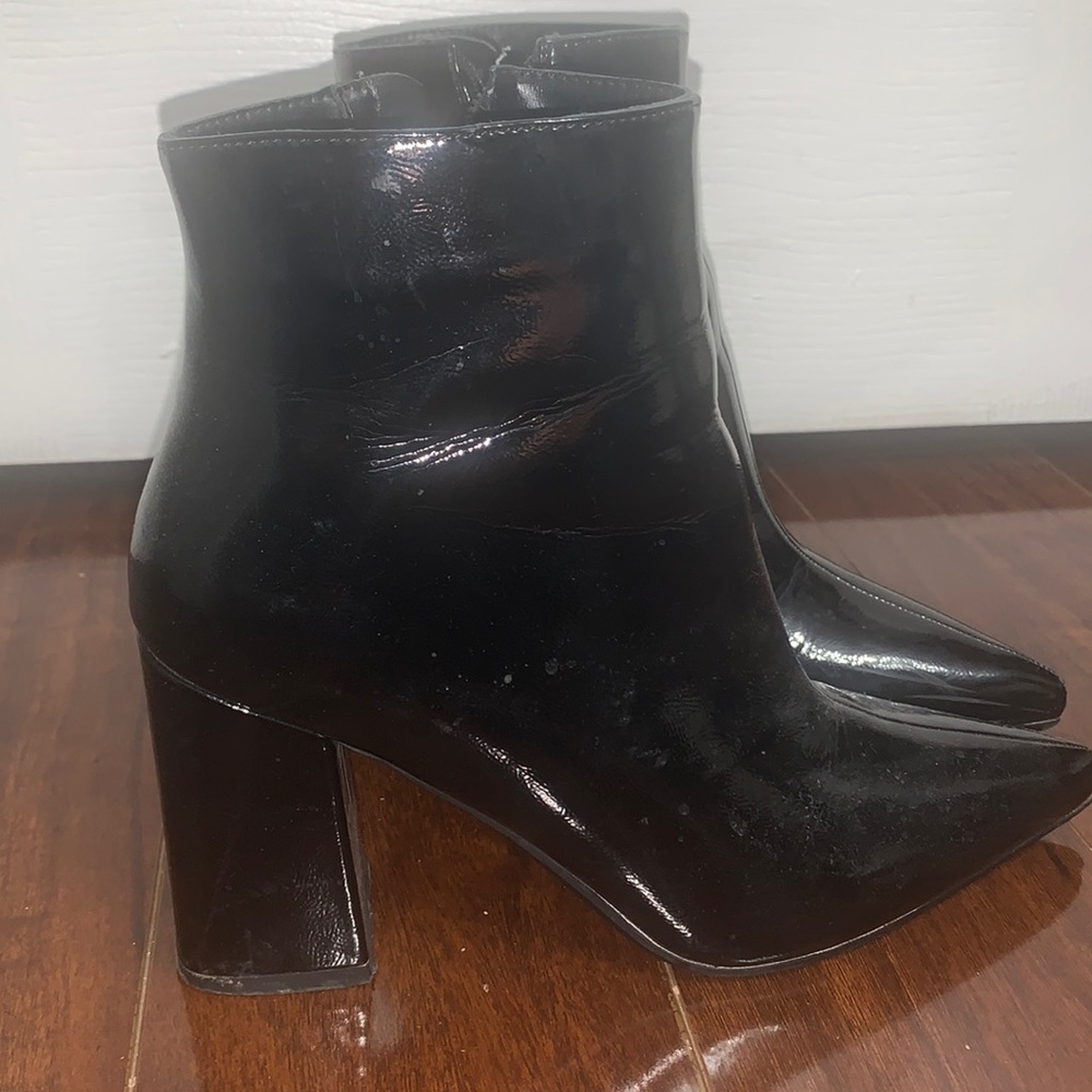 Black pointy toed booties